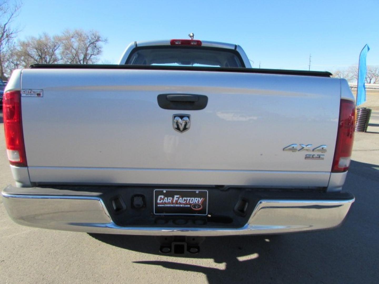 2005 Silver /Gray Dodge Ram 1500 SLT (1D7HU18D15S) with an 5.7 Hemi V8 engine engine, 5 speed automatic transmission, located at 4562 State Avenue, Billings, MT, 59101, (406) 896-9833, 45.769516, -108.526772 - 2005 Dodge Ram 1500 SLT Quad Cab Short Bed 4WD 5.7L V8 OHV 16V Hemi Engine - 5 speed automatic transmission - 4 wheel drive - 159,014 miles SLT package - air conditioning - tilt wheel - cruise control - AM/FM/CD audio - power windows and door locks - power drivers seat - privacy glass - keyles - Photo#1